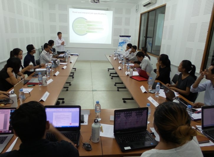 Workshop session with participants and laptops